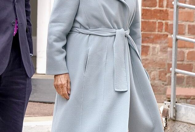 Queen Camilla (pictured) looked typically elegant in a pale blue coat and wide-brimmed cream hat complete with a bow