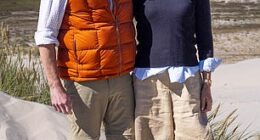 A royal press call with King Frederik and Queen Mary of Denmark standing in the Råbjerg Mile sand dunes started off stilted and formal