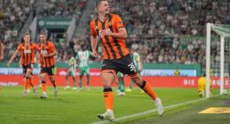 Max Watters races away to celebrate after hauling United level in the first half