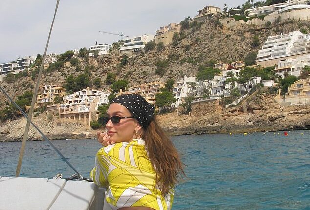 Infleuncer Hailey, 28, sent her fans wild over her perky bottom in bikini photos when she posted a selection in barely-there yellow swimwear recently