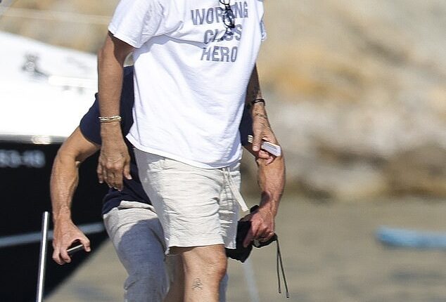 Rita Ora's husband had a rather tone-deaf choice of apparel for Chris Hemsworth's star-studded birthday boating trip