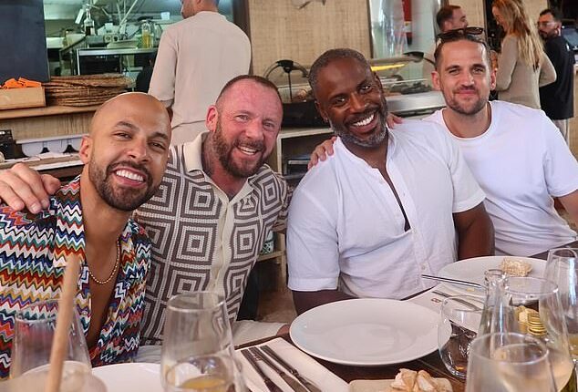 Rochelle Humes has raised eyebrows after sharing a photo of Myleene Klass' ex-husband Graham Quinn (centre left) posing with her husband Marvin (left) in Ibiza on Monday