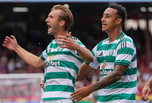 Adam Idah congratulates Benjamin Nygren on his goal, but the Irishman needs one himself