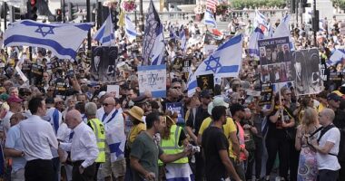 Scuffles have reportedly broken out during a protest calling on the government to do more to free Israeli hostages held captive by Hamas (pictured are some of the campaigners today)