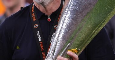 Ange Postecoglou was sacked by Tottenham in June despite winning the Europa League (pictured) - but he is clearly living his best life away from football