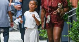 Serena Williams beat the summer heat while showcasing her toned legs on a family outing in New York City on Thursday with her husband Alexis Ohanian, daughters Alexis Olympia, seven and Adira, 21 months