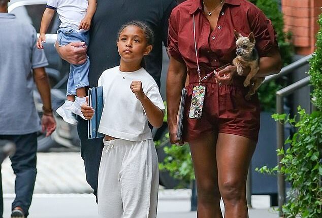 Serena Williams beat the summer heat while showcasing her toned legs on a family outing in New York City on Thursday with her husband Alexis Ohanian, daughters Alexis Olympia, seven and Adira, 21 months