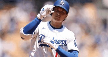 Shohei Ohtani during a 2025 Dodgers game, amid reports from The Japan News about a Hawaii real estate lawsuit.
