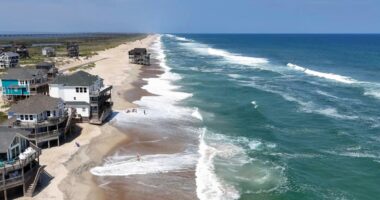 Summer celebrations meet closed beaches and warnings on US East Coast due to Hurricane Erin