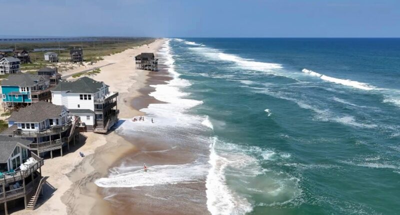 Summer celebrations meet closed beaches and warnings on US East Coast due to Hurricane Erin