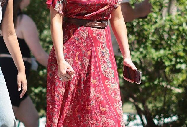 Suri Cruise was spotted channeling her mom Katie Holmes' quirky style while out in New York City on Friday