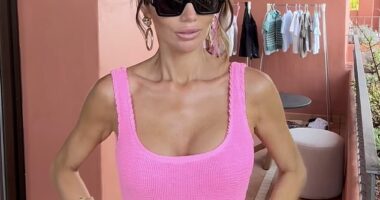 Amy Childs turned heads in a pink swimsuit as she showcased her trim figure on Instagram on Thursday
