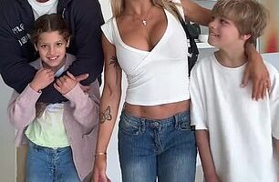 The fitness influencer (second from right) shared a clip on TikTok that showed her posing alongside her former partner (far left) and the two kids they share, Saskia (second from left) and Wolf (far right)