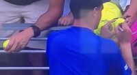 Kamil Majchrzak was signing autographs for young fans after his marathon five-set victory