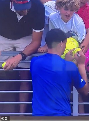 Kamil Majchrzak was signing autographs for young fans after his marathon five-set victory