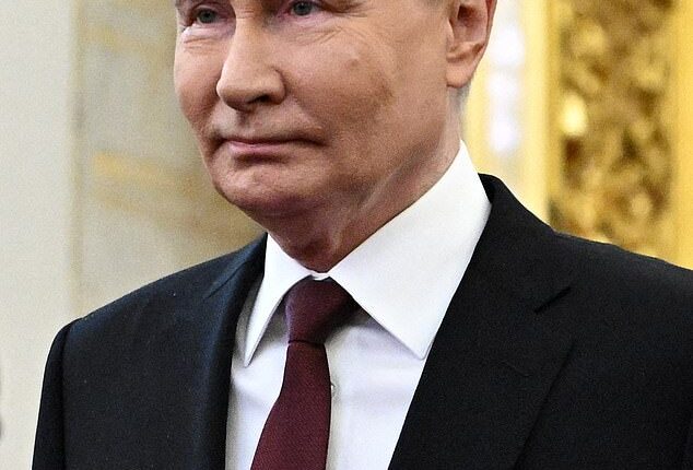 A frontal view of Putin's face at a ceremony in 2024