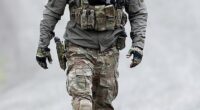 A Special Operations Group officer prepares to enter the wilderness to take down Freeman