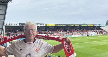 David Jones spent almost all of Morecambe's clash with Altrincham keeping his allegiances under wraps - until he could wait no longer