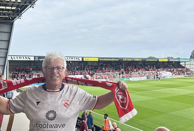 David Jones spent almost all of Morecambe's clash with Altrincham keeping his allegiances under wraps - until he could wait no longer