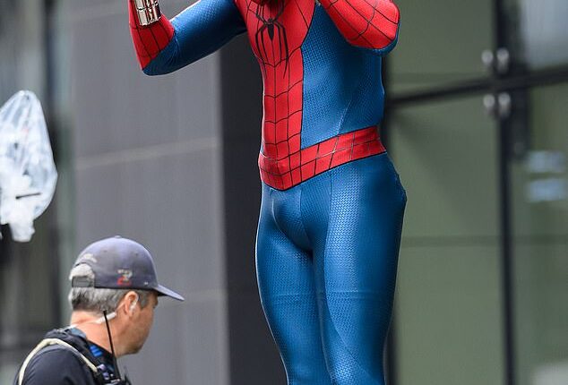 Tom Holland, 29, was all smiles on the set of the new Spider-Man film in Glasgow on Sunday, after he finally addressed speculation he could be the next James Bond