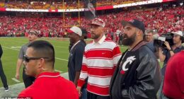 Flying solo without his new fiancee , Travis was joined by another former Bearcat, his brother Jason, on the sideline ahead of Thursday's season opener