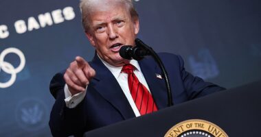 U.S. President Donald Trump takes questions from reporters about his desire to takeover Washington, DC