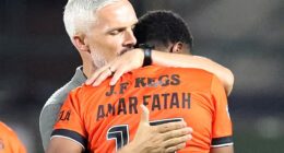 Jim Goodwin consoles Amar Fatah after his missed penalty in the Tannadice shootout