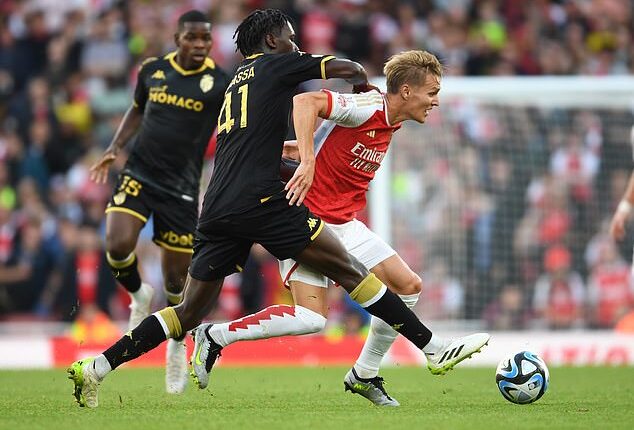 Soungoutou Magassa, pictured (centre) tackling Arsenal's Martin Odegaard during a pre-season friendly in 2023, has been the subject of a £17m offer from West Ham United