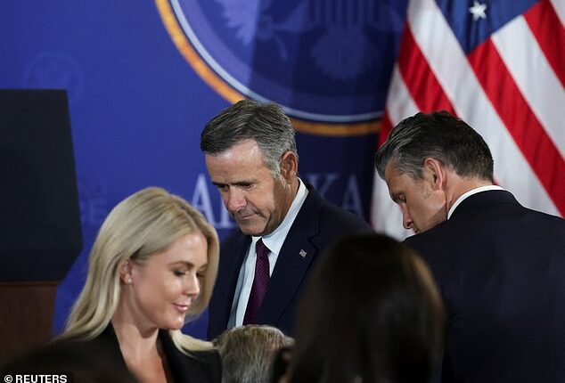 U.S. Defense Secretary Pete Hegseth, CIA Director John Ratcliffe and White House Press Secretary Karoline Leavitt gather ahead of a joint press conference by U.S. President Donald Trump and Russian President Vladimir Putin