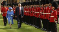 Queen Elizabeth and Donald Trump are pictured inspecting the Guard of Honor at Windsor Castle in July 2018