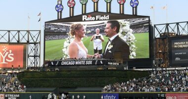 Two lifelong Chicago White Sox fans exchange wedding vows during a 60-second wedding officiated by former White Sox player and 1983 rookie of the year Ron Kittle