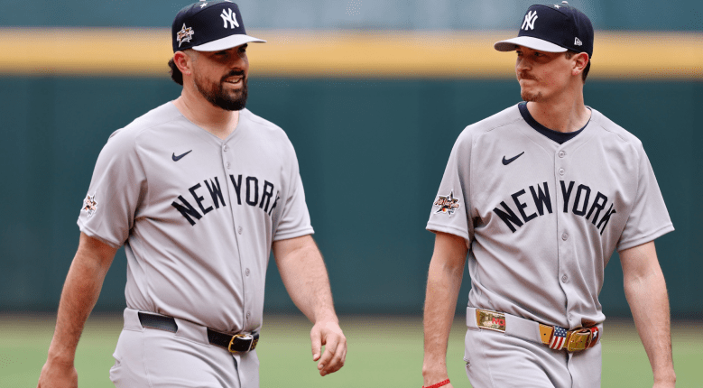 Yankees starters Max Fried and Carlos Rodón walking together on the field, both struggling to pitch deep into games during the team’s slump.