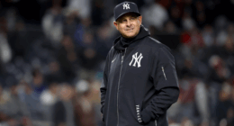Chris Russo speaking during a podcast appearance, criticizing the New York Yankees for not hiring Terry Francona to replace Aaron Boone.