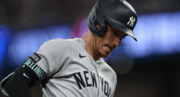 Cody Bellinger looks on during a Yankees game in 2025 amid speculation about his future.