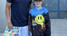 Kamil Majchrzak has been reunited with the young boy who had a souvenir cap snatched away