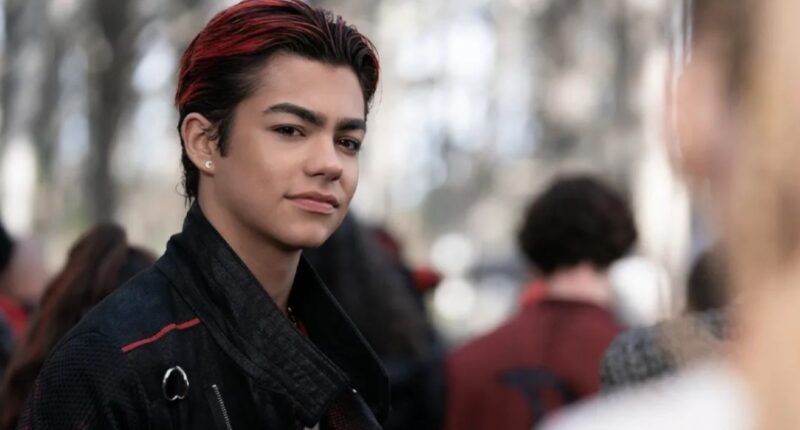 malachi barton image smiling in dark clothing