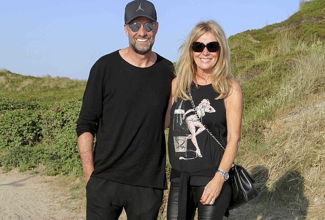 Jurgen Klopp says he does not miss management and has absolutely no plans to return (pictured with his wife Ulla)