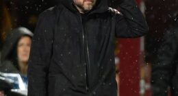 A rain-soaked Jimmy Thelin looks on from the Fir Park dugout as his side stumbled yet again