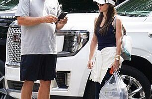 Bill Belichick's girlfriend Jordon Hudson and a fan