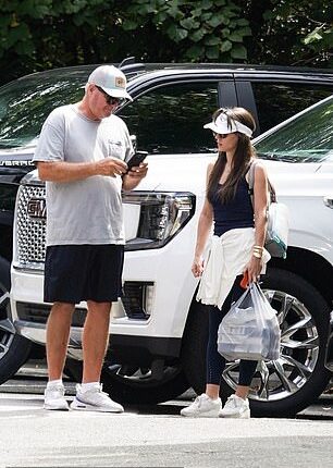 Bill Belichick's girlfriend Jordon Hudson and a fan