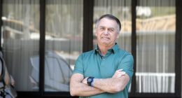 Former Brazilian president Jair Bolsonaro could spend decades behind bars after the country's Supreme Court formed a majority on Thursday to convict him of being part of an armed criminal organization. Pictured: olsonaro gestures at the garage of his residence in Brasilia on September 11, 2025