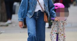 Cameron Diaz looked every bit the doting parent while on a rare public outing with her five-year-old daughter Raddix on Wednesday