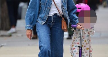 Cameron Diaz looked every bit the doting parent while on a rare public outing with her five-year-old daughter Raddix on Wednesday