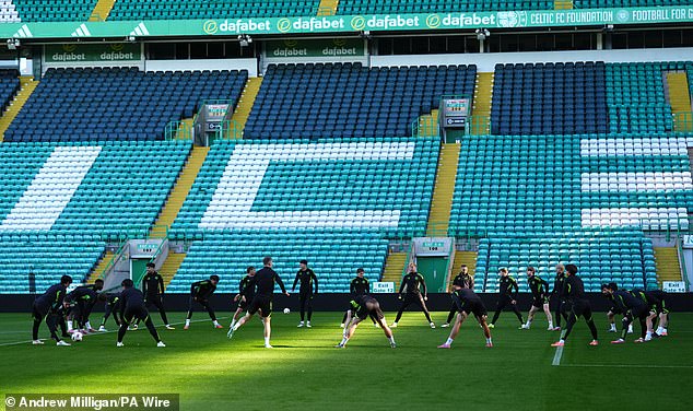 The Celtic players are put through their paces at Parkhead ahead of their trip to Belgrade