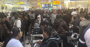 Heathrow has warned of delays for passengers after cyber hackers targeted a service provider for several major European airports. PIctured: Passengers queue at Heathrow on Saturday after a cyber attack on an airline service provider
