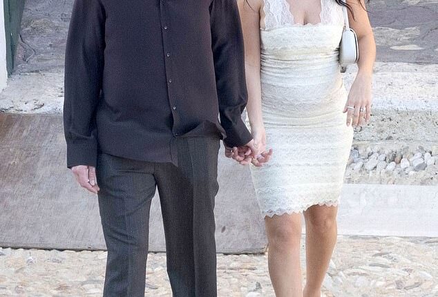 Charli XCX wore bridal white ahead of second wedding in Italy with her husband George Daniel on Friday