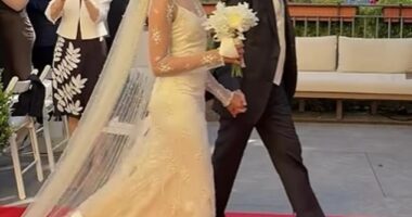 Dame Joan Collins was overjoyed as she watched her only son, the artist Alexander ‘Sacha’ Newley, tie the knot with jazz singer Sheela Raman in a gorgeous ceremony at a lakeside castle