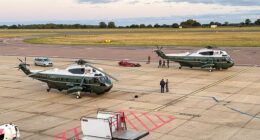 President Donald Trump's helicopters, known as Marine One and Marine Two are seen at Luton Airport after reportedly having to make an emergency landing with Trump on board