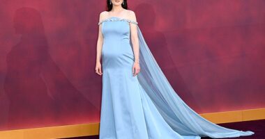 Michelle Dockery has insisted she's nothing like her character Lady Mary Crawley as she hit back at claims she is posh after revealing her pregnancy at the at the premiere