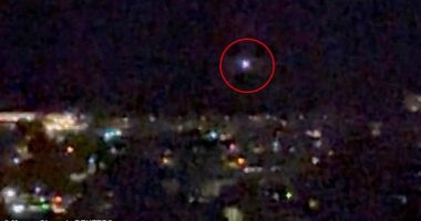 A light moves in the sky over Aalborg, amid reports of drone sightings that led to the airport being closed for several hours on Thursday